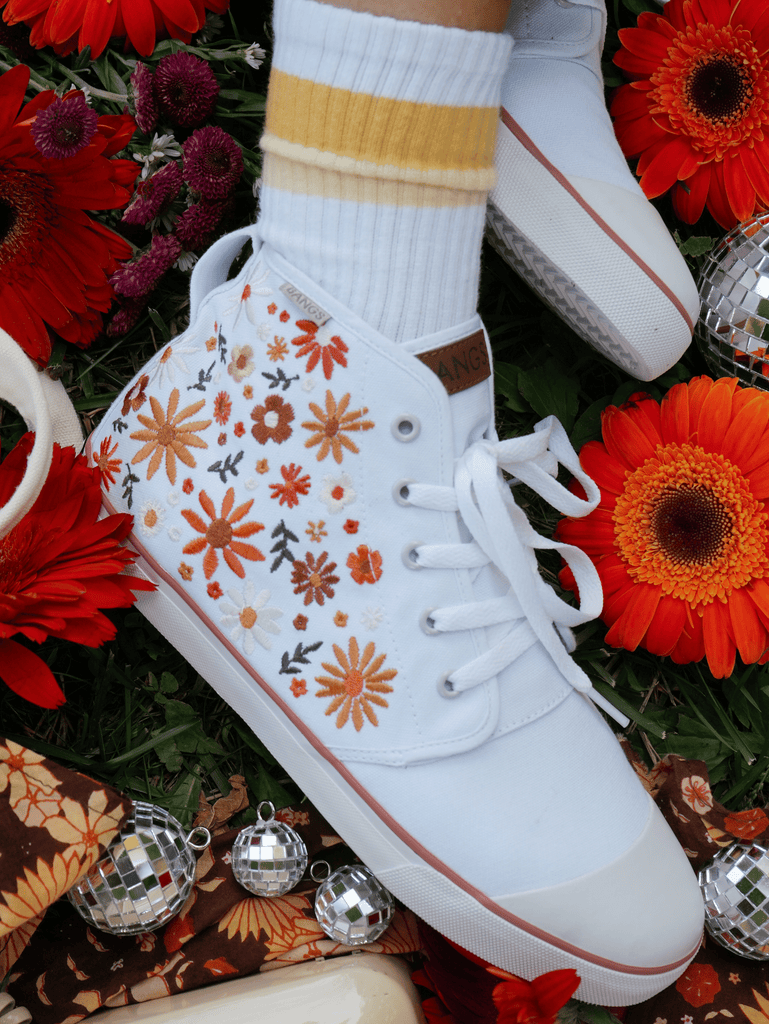 Shoes with 2025 embroidered flowers